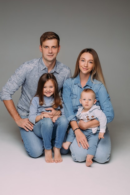 beautiful-caucasian-family-sit-together-picture-isolated-white-background_132075-9299